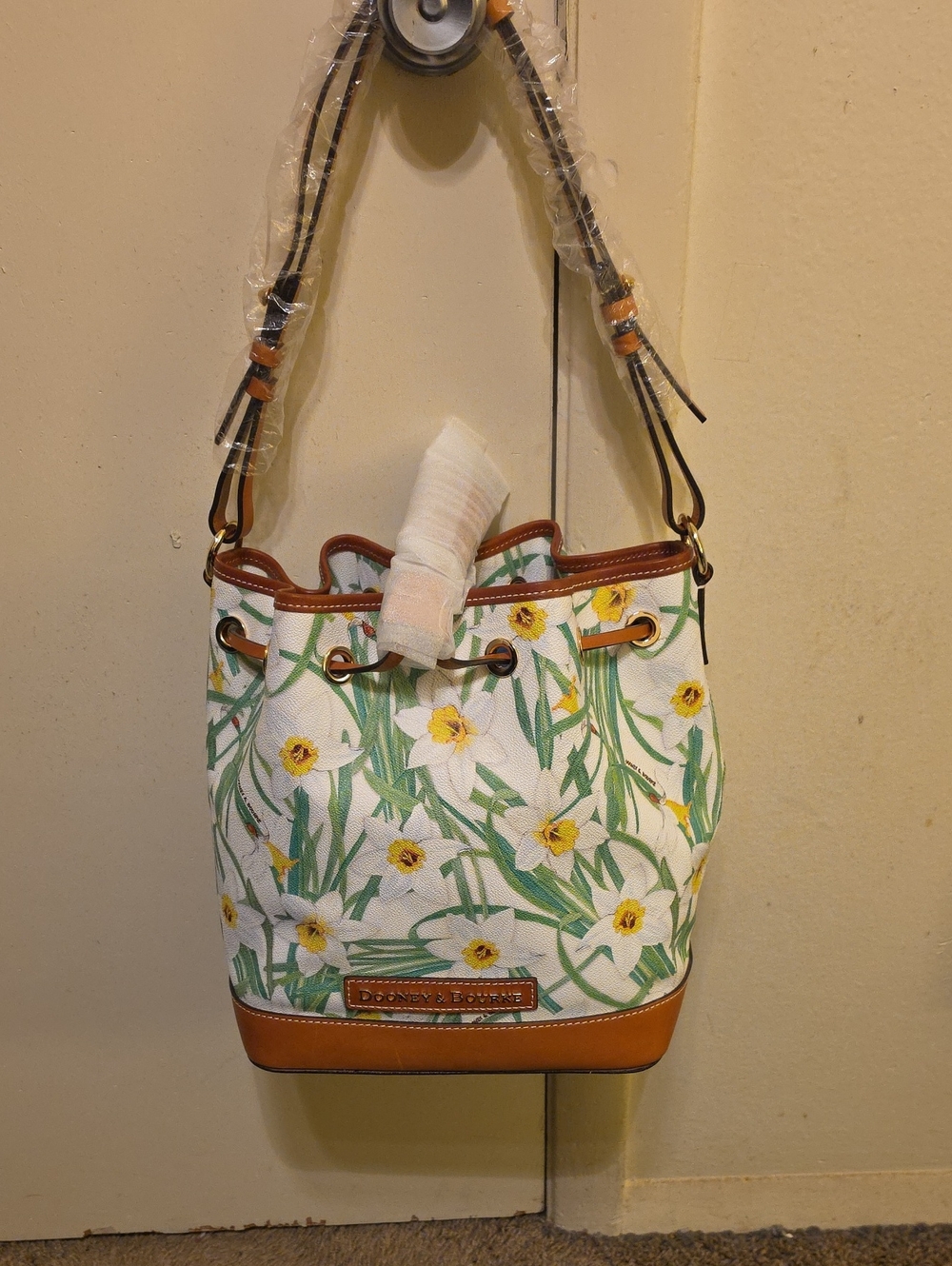 Dooney & Bourke White Floral Drawstring Bucket Purse with Brown Trim